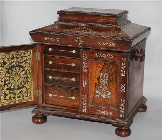 A Victorian mother of pearl-inlaid rosewood work-cum-writing cabinet